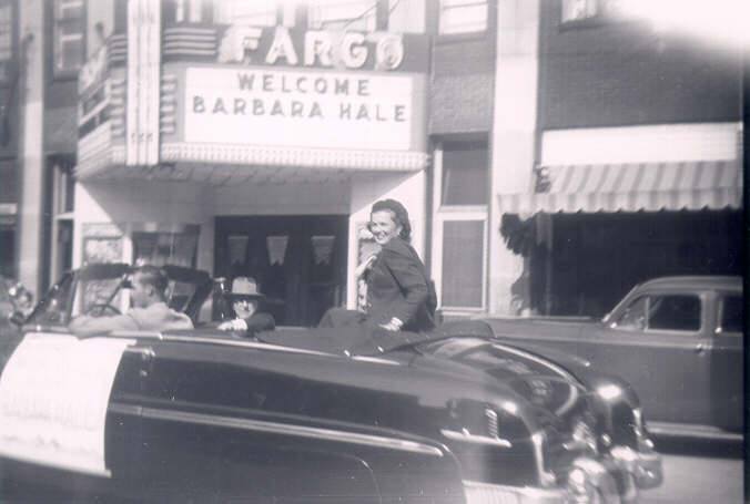 Barbara Hale in DeKalb for a homecoming parade in 1951 on Lincoln Hwy (Rt. 38) heading West in front of the old Fargo Theatre.